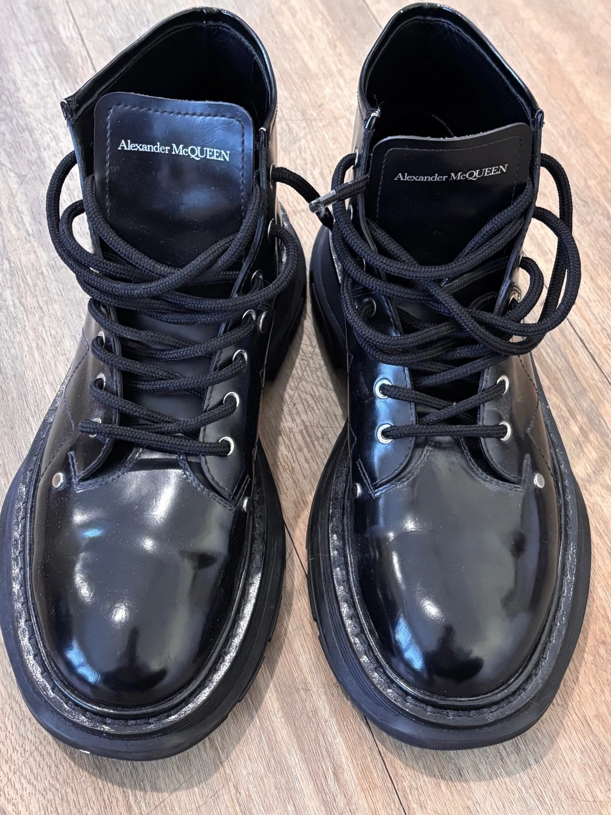 Alexander McQueen — Alexander McQueen black patent leather Tread lace up boots 41